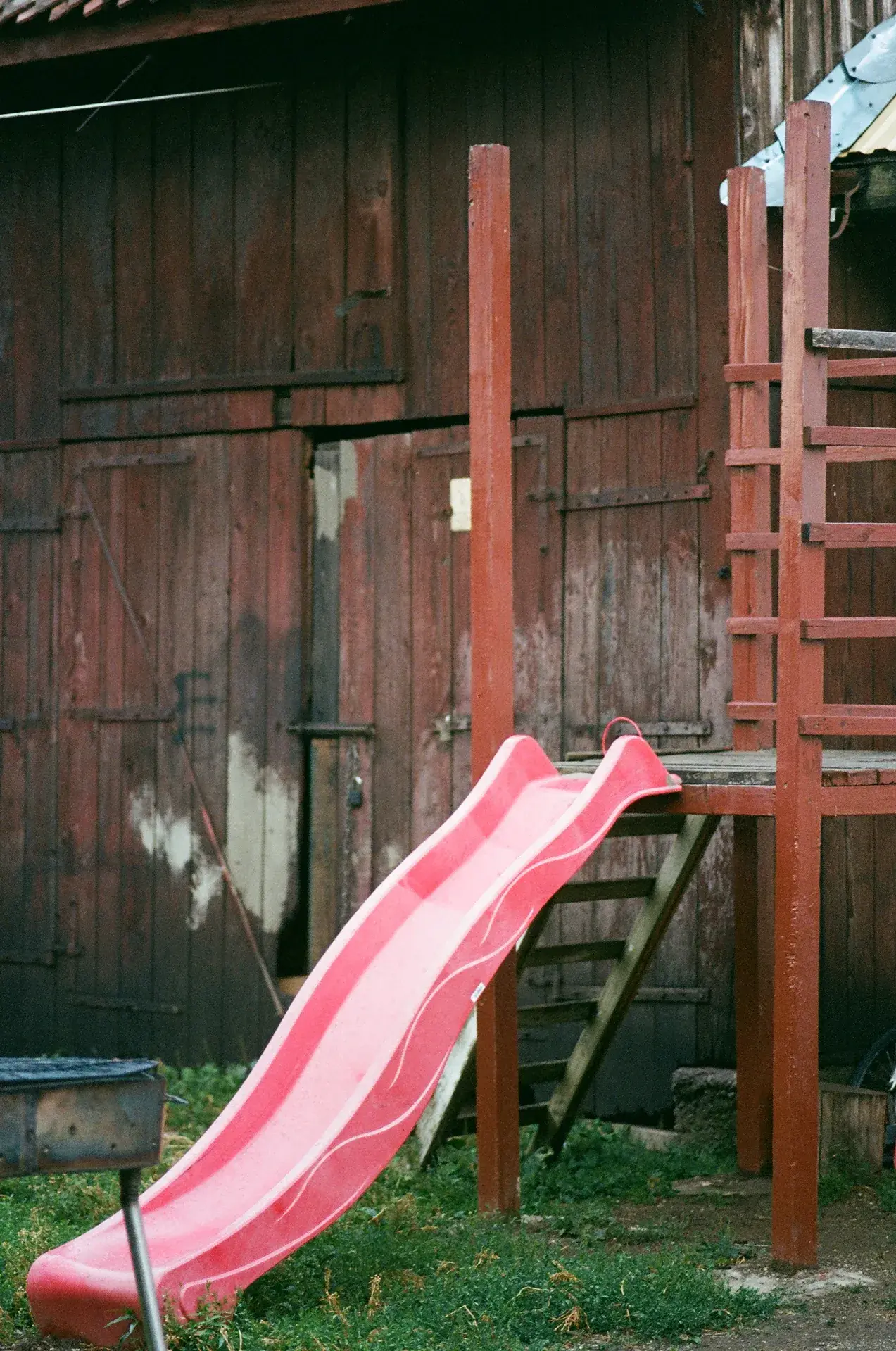 A woman presumbly walking home with a grocery bag
